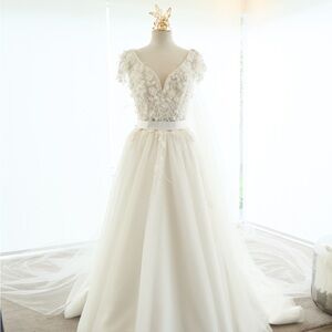 Chic Ivory Bridal Gown with Floral Accents